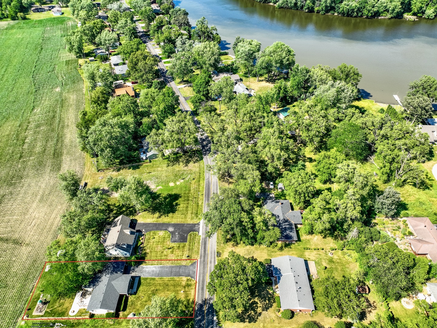 3248 River Road Kankakee, IL 60901 - Photo 20 of 32 an aerial view of a house with a yard and lake view
