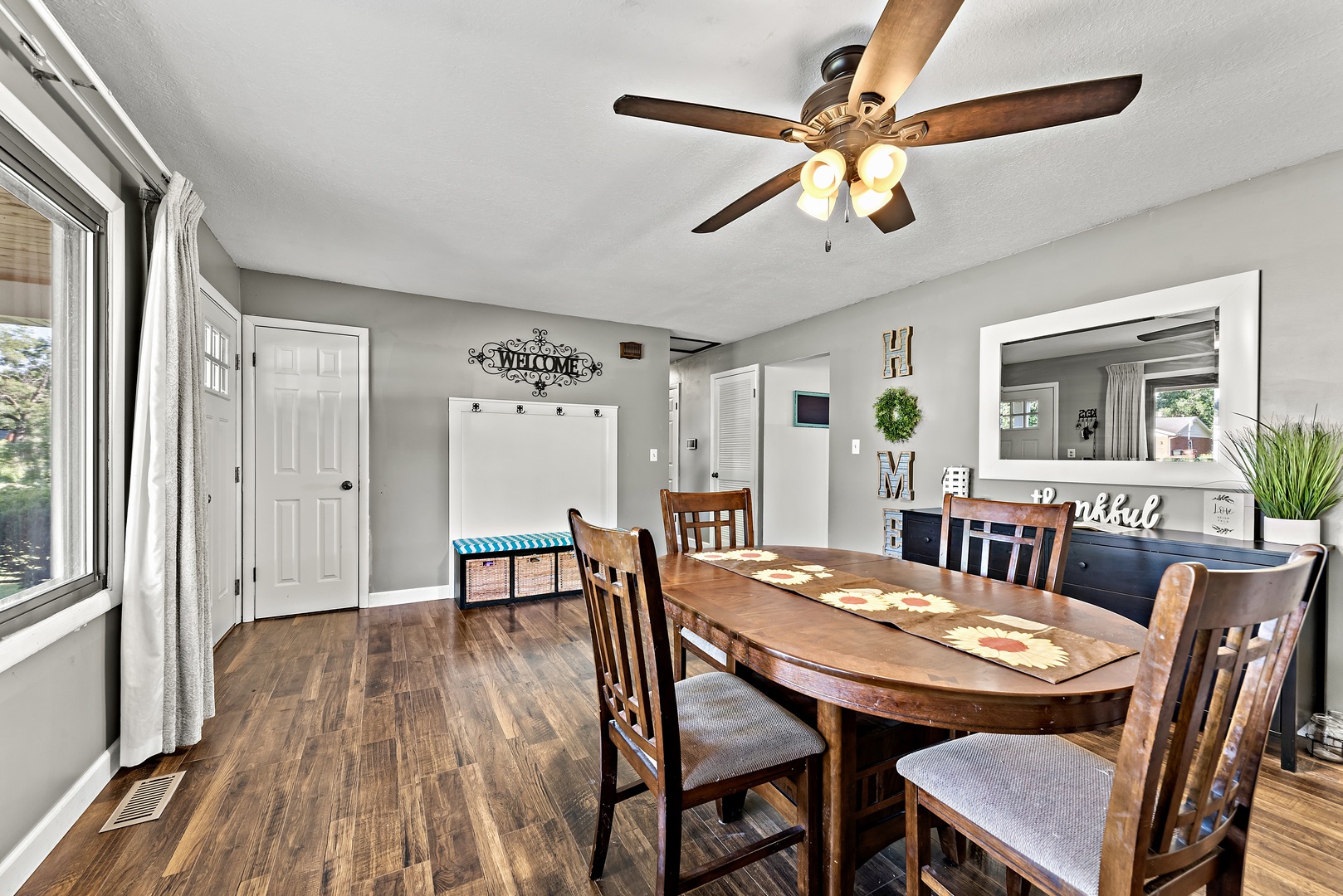 3248 River Road Kankakee, IL 60901 - Photo 2 of 32 a view of a dining room with furniture and wooden floor