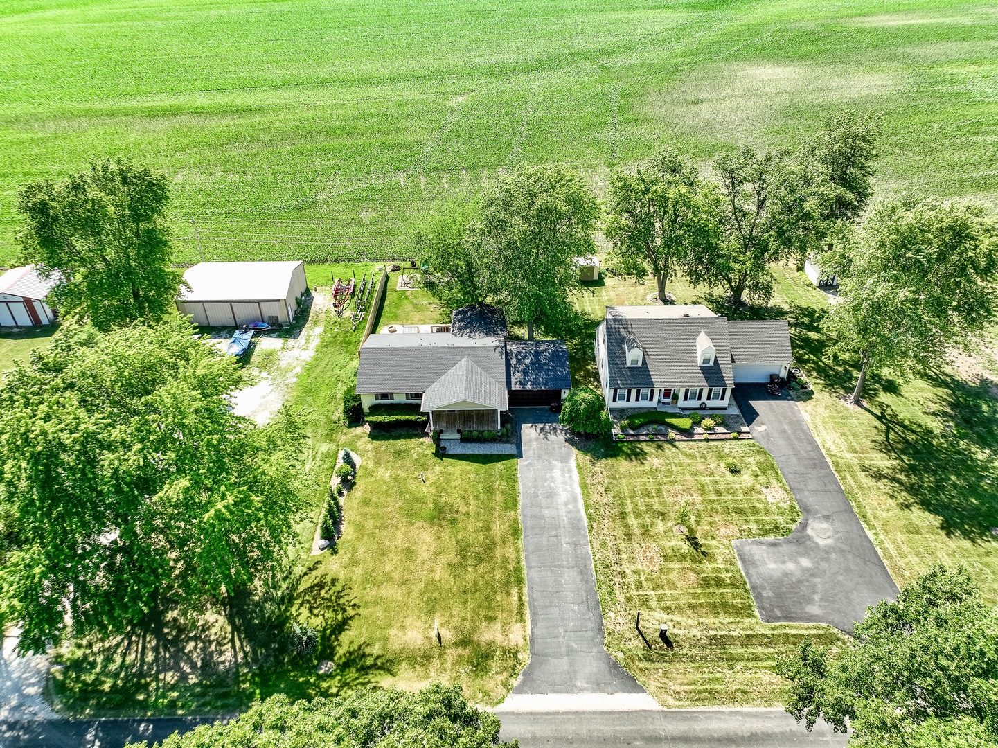 3248 River Road Kankakee, IL 60901 - Photo 21 of 32 an aerial view of a house with swimming pool and big yard