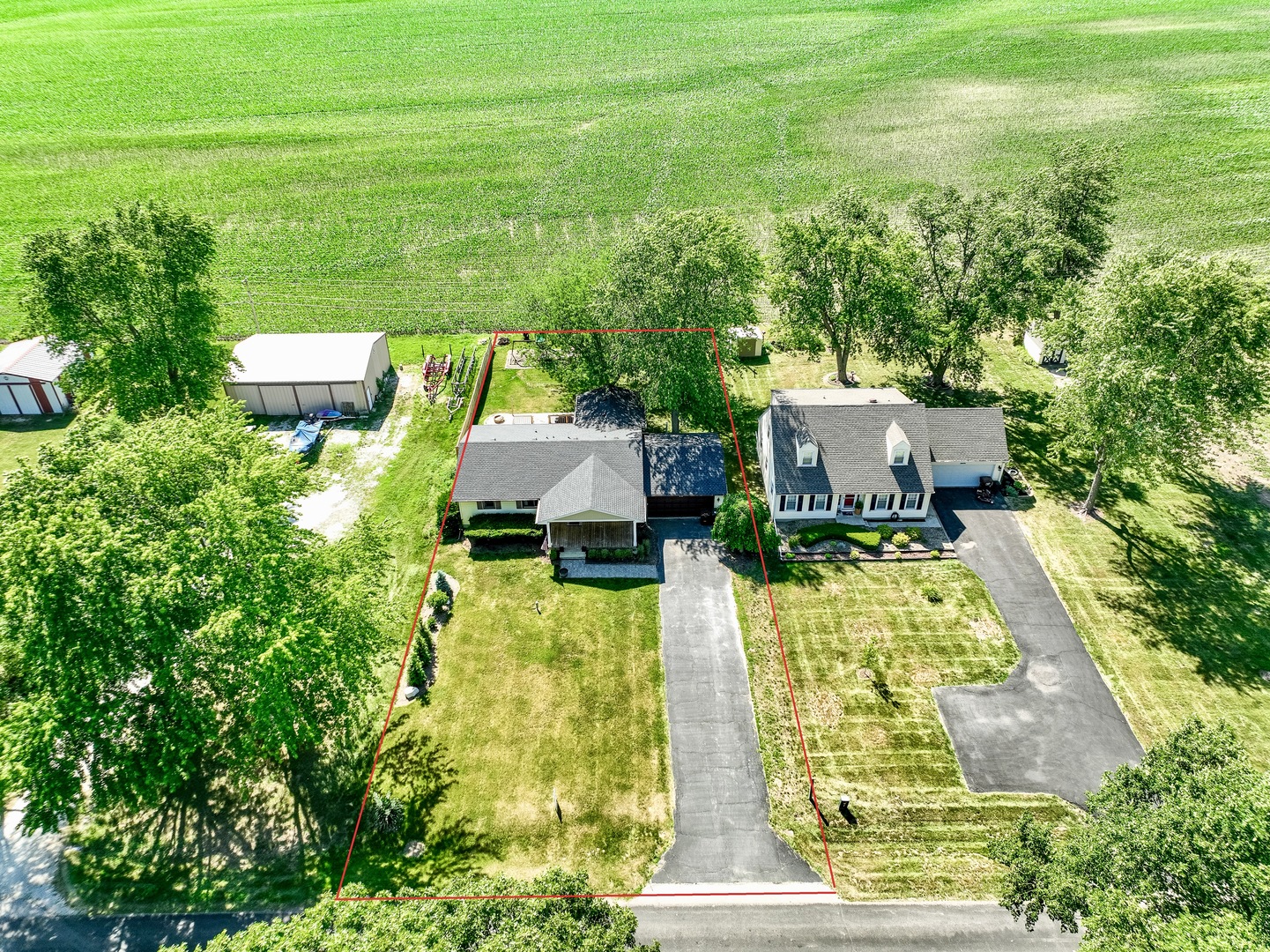 3248 River Road Kankakee, IL 60901 - Photo 22 of 32 an aerial view of a house with swimming pool and big yard