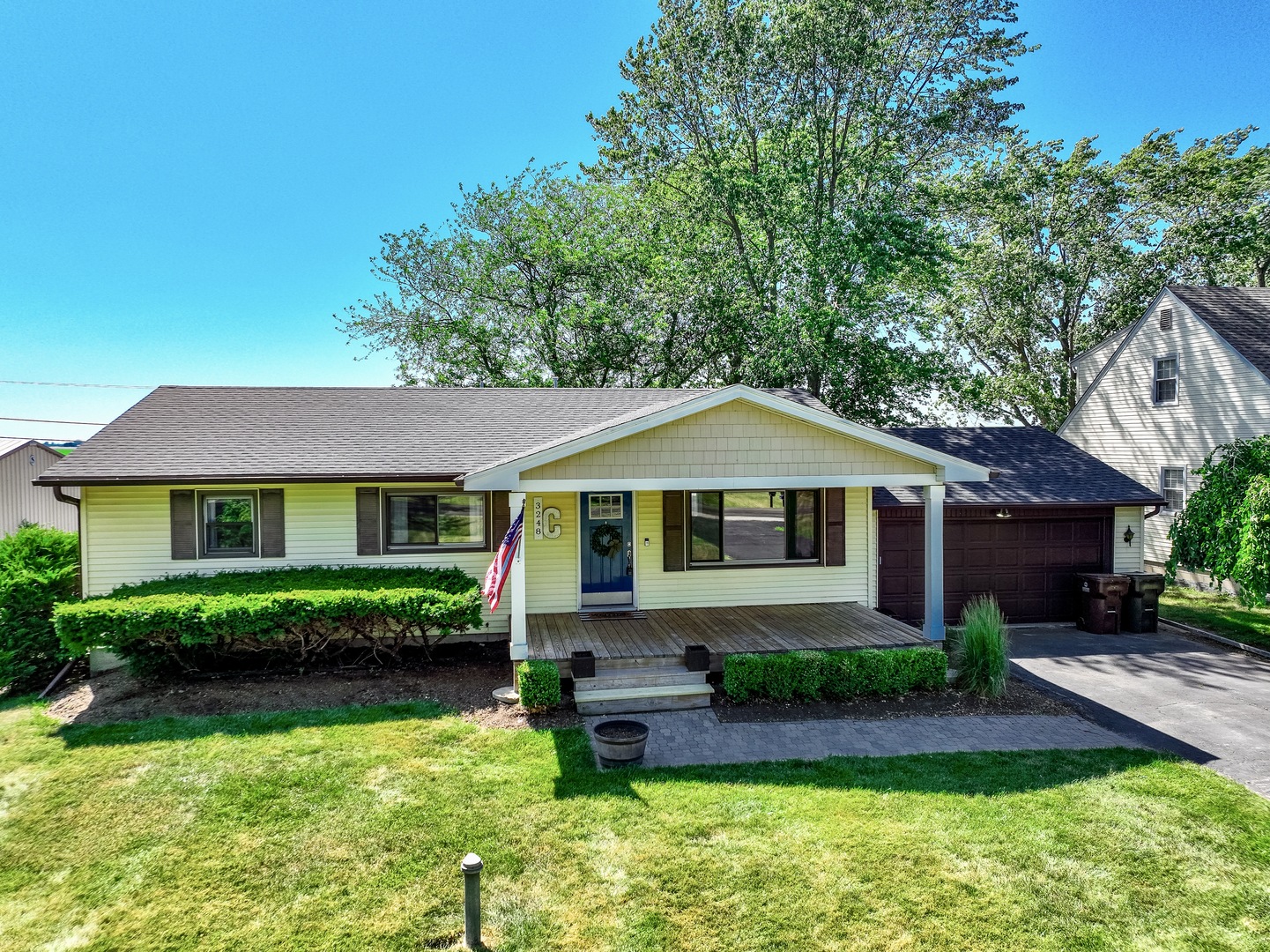 3248 River Road Kankakee, IL 60901 - Photo 28 of 32 a front view of a house with a yard