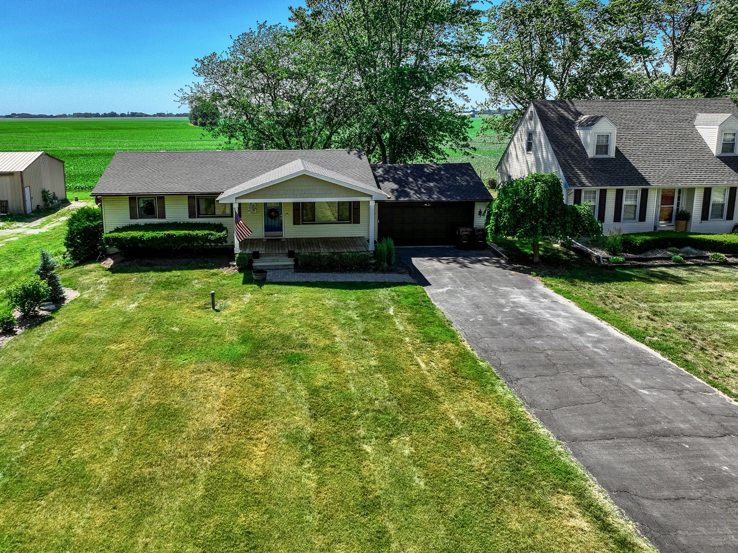 3248 River Road Kankakee, IL 60901 - Photo 29 of 32 a front view of a house with garden