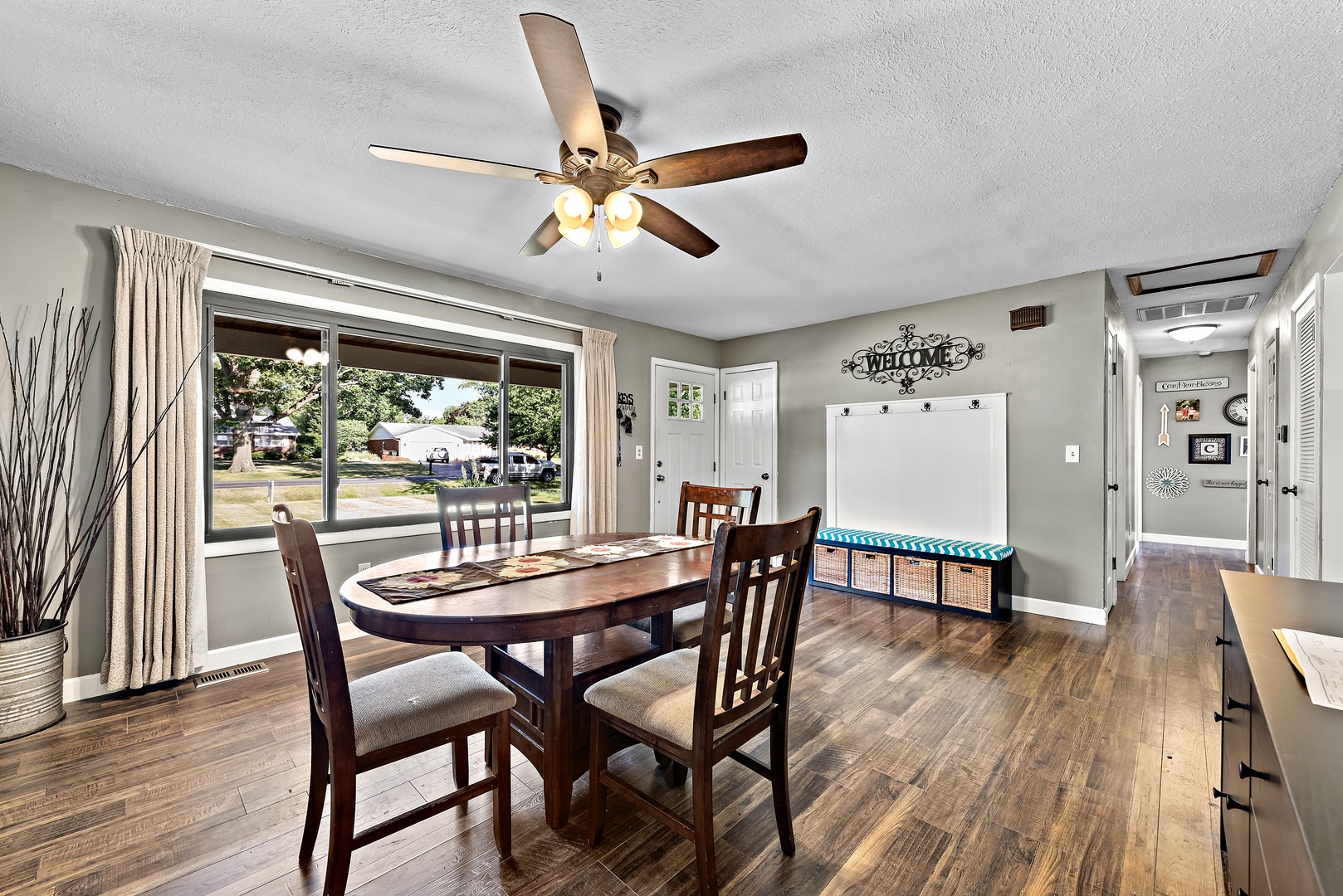 3248 River Road Kankakee, IL 60901 - Photo 3 of 32 a dining room with furniture a window and wooden floor