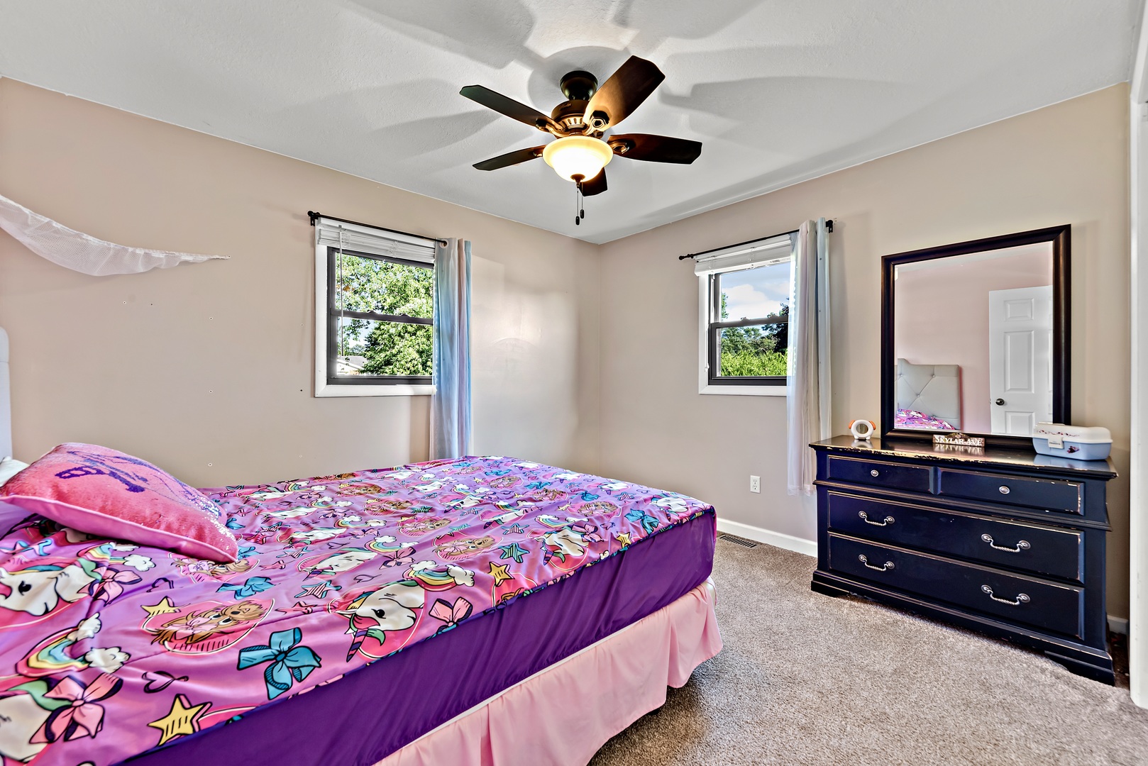 3248 River Road Kankakee, IL 60901 - Photo 10 of 32 a bedroom with a bed dresser and a window