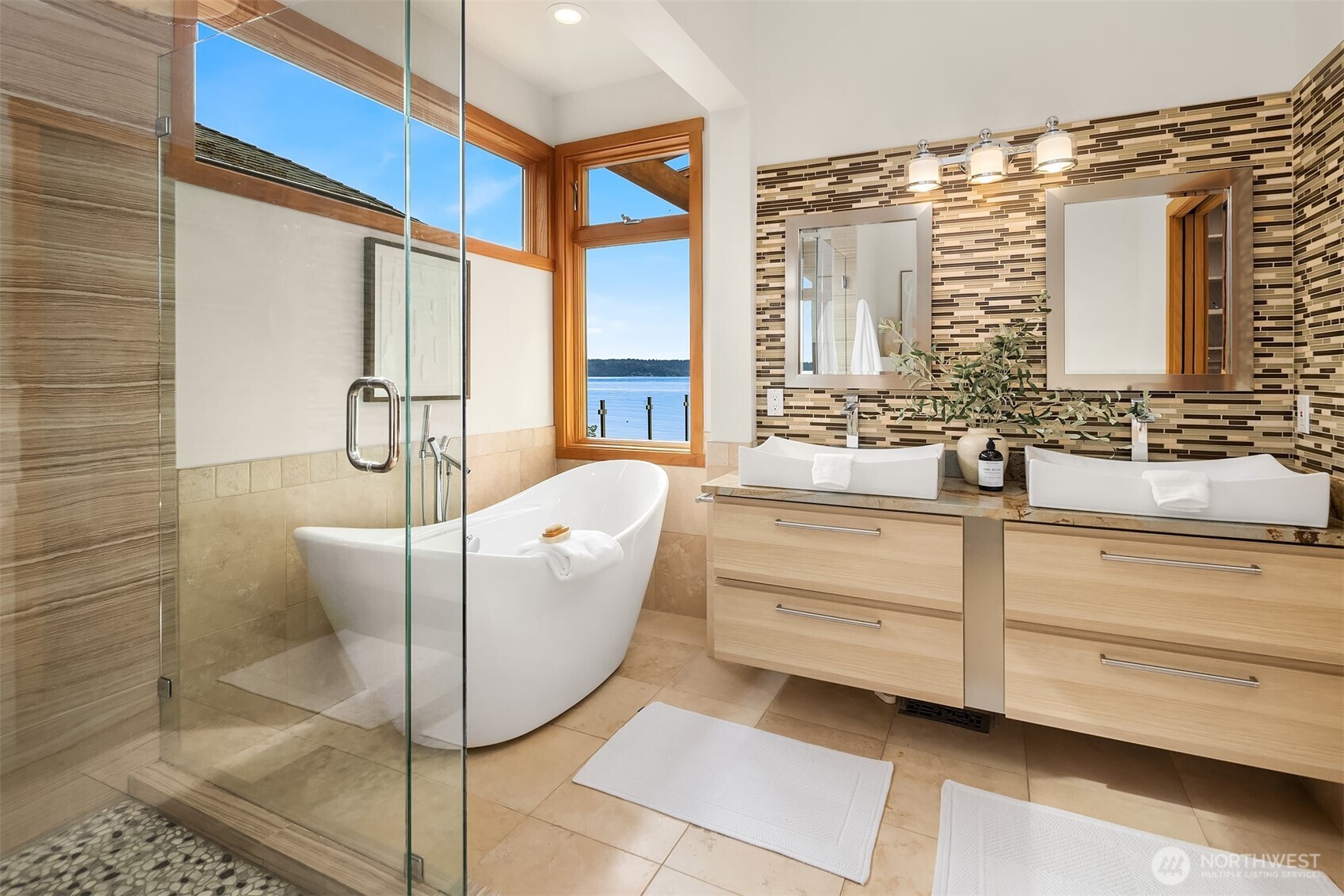 16947 Maplewild Avenue Southwest Burien, WA 98166 - Photo 11 of 23 a bathroom with a bathtub and a shower