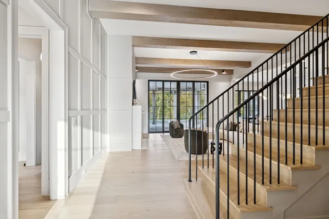 a kitchen with granite countertop a stove and a sink