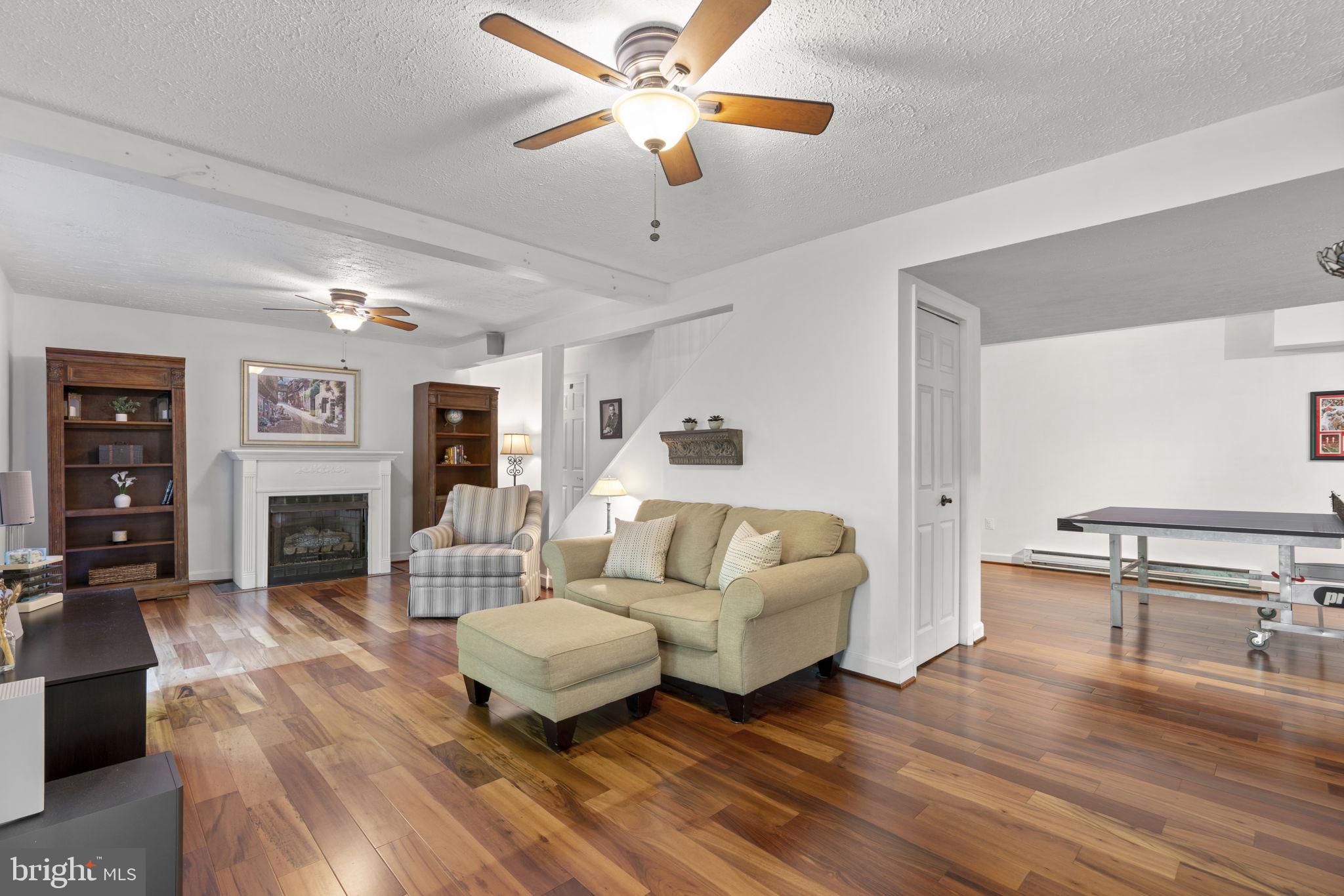 7968 Browns Bridge Road Highland, MD 20777 - Photo 21 of 49 Warm gas fireplace and family room