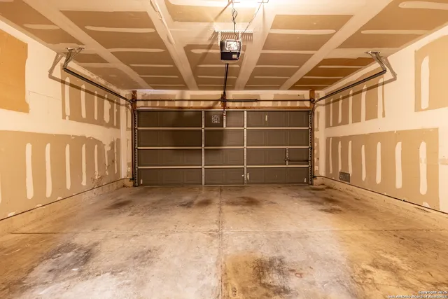 a backyard of a house with a tree