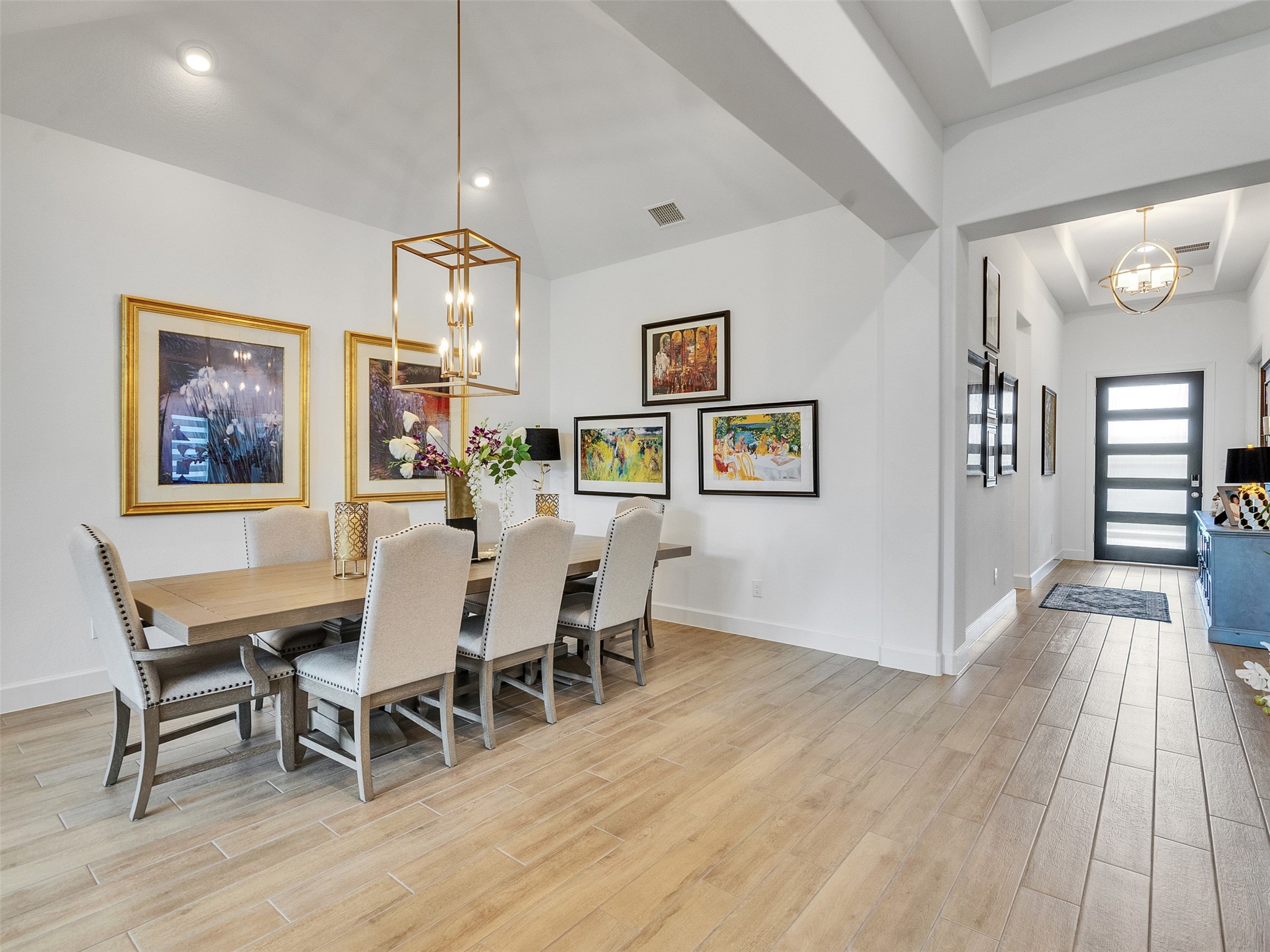 5422 Farm Hill Way Fulshear, TX 77406 - Photo 17 of 50 a view of a dining room with furniture and wooden floor