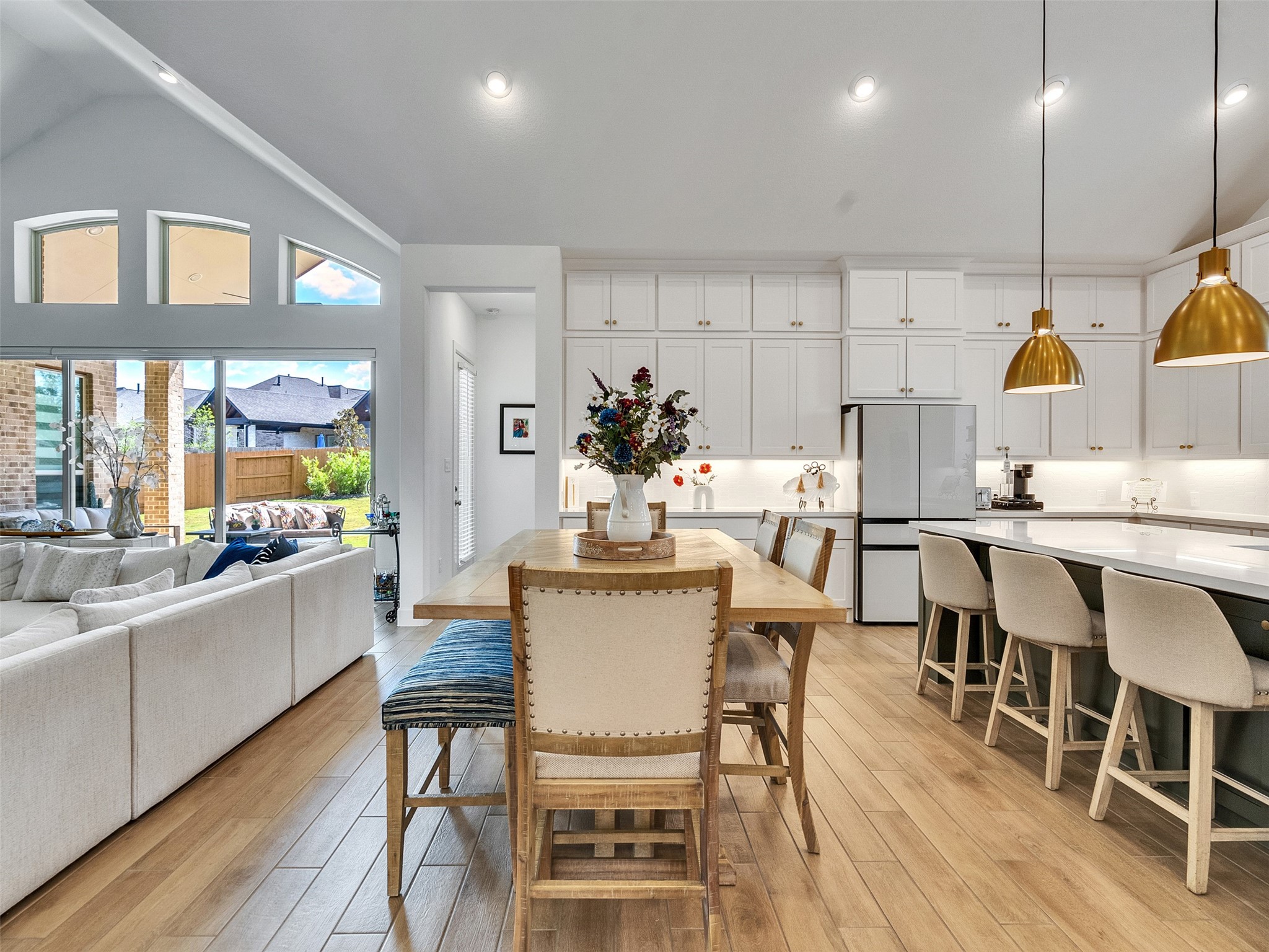 5422 Farm Hill Way Fulshear, TX 77406 - Photo 26 of 50 a view of a dining room with furniture and wooden floor