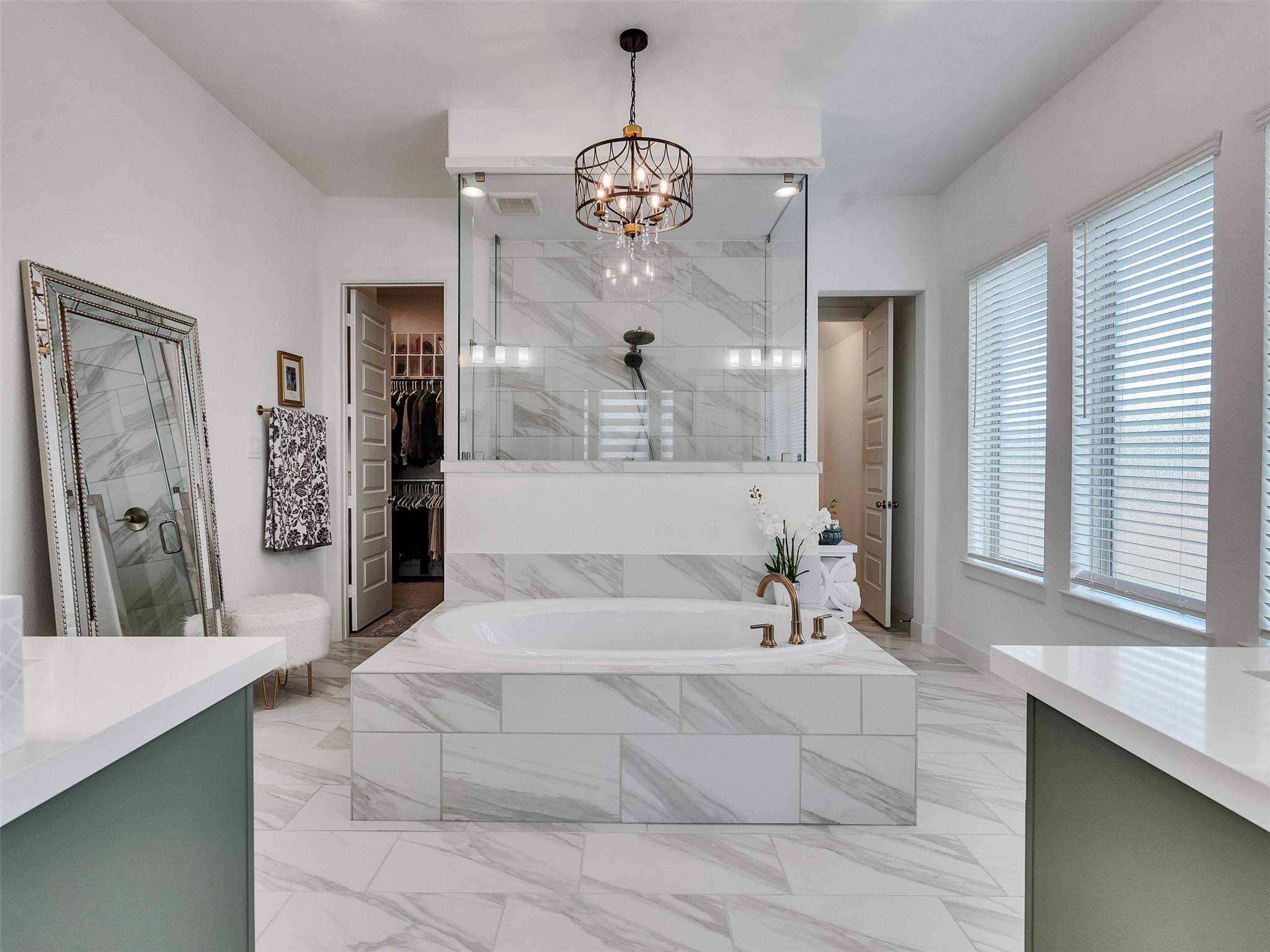 5422 Farm Hill Way Fulshear, TX 77406 - Photo 40 of 50 a spacious bathroom with a sink a large mirror and a shower