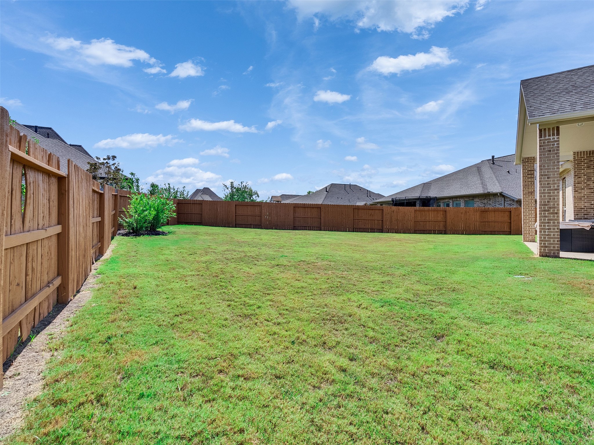 5422 Farm Hill Way Fulshear, TX 77406 - Photo 45 of 50 a view of a backyard