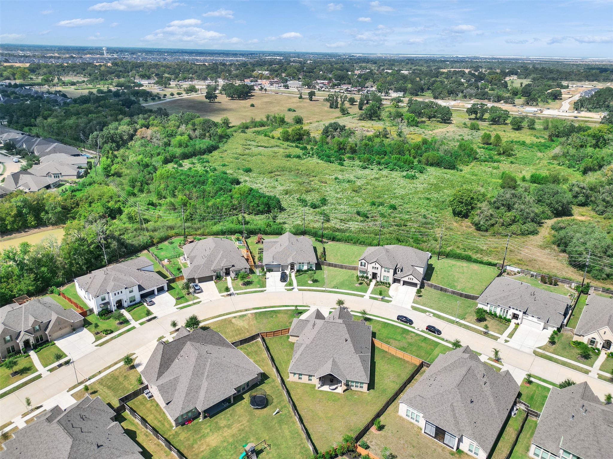 5422 Farm Hill Way Fulshear, TX 77406 - Photo 5 of 50 an aerial view of a house with outdoor space