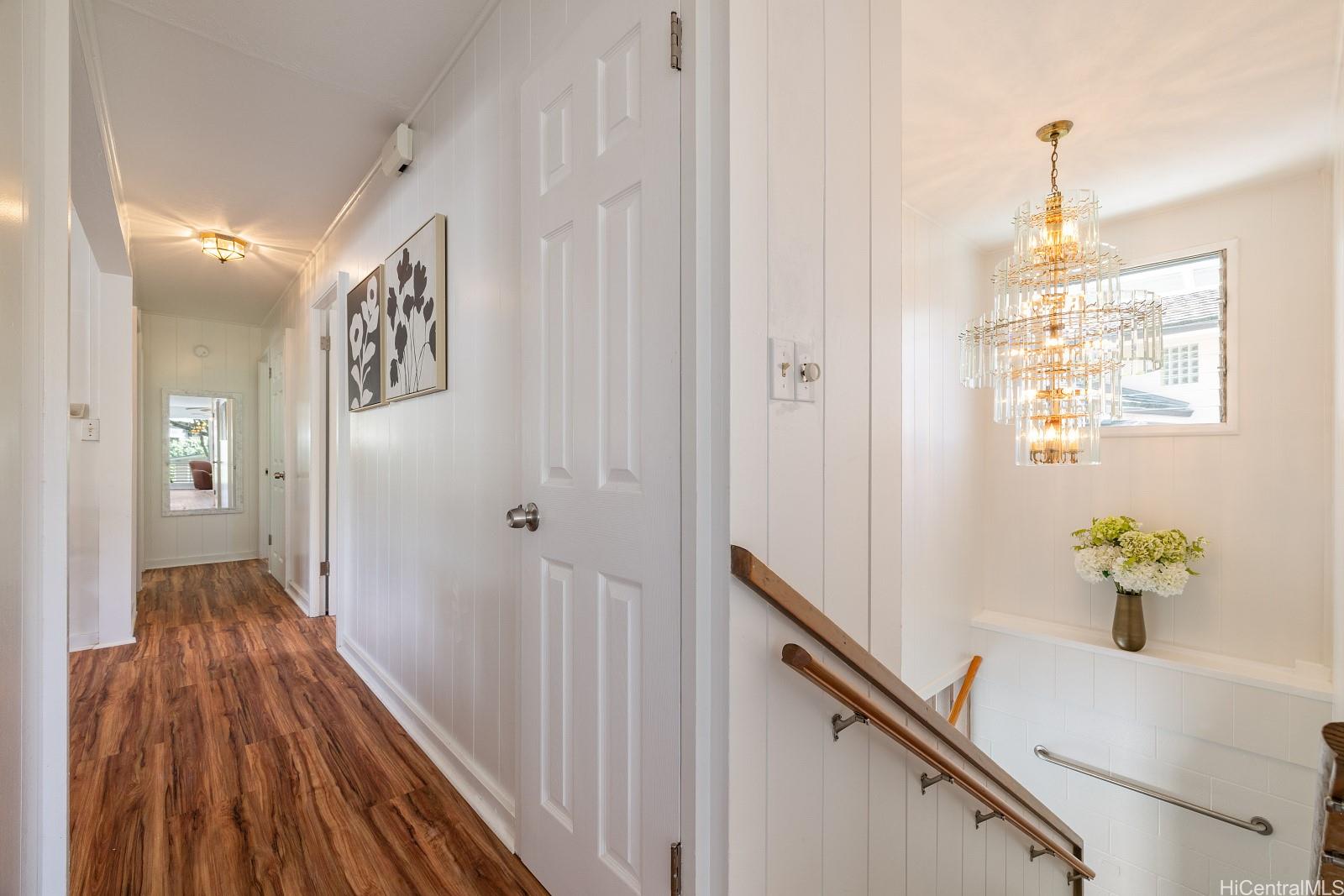 240 Puiwa Road Honolulu, HI 96817 - Photo 12 of 18 a view of hallway with wooden floor