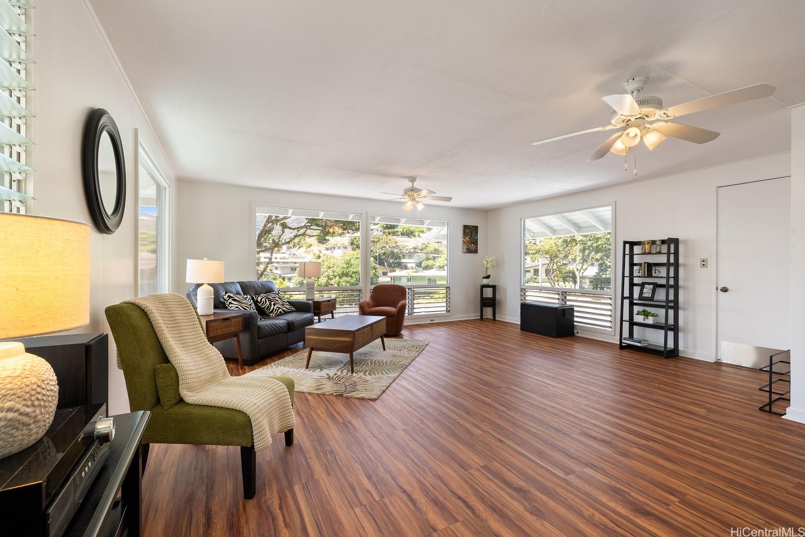 240 Puiwa Road Honolulu, HI 96817 - Photo 2 of 18 a living room with furniture and a large window