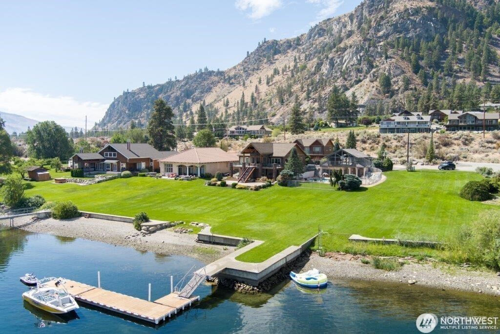 15330 Lakeview Street Entiat, WA 98822 - Photo 21 of 27 an aerial view of a house with a garden and lake view