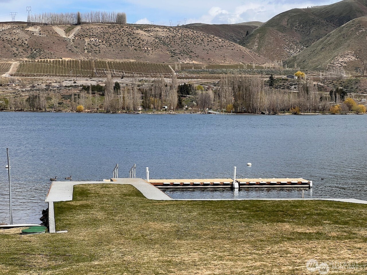 15330 Lakeview Street Entiat, WA 98822 - Photo 25 of 27 a view of houses with swimming pool