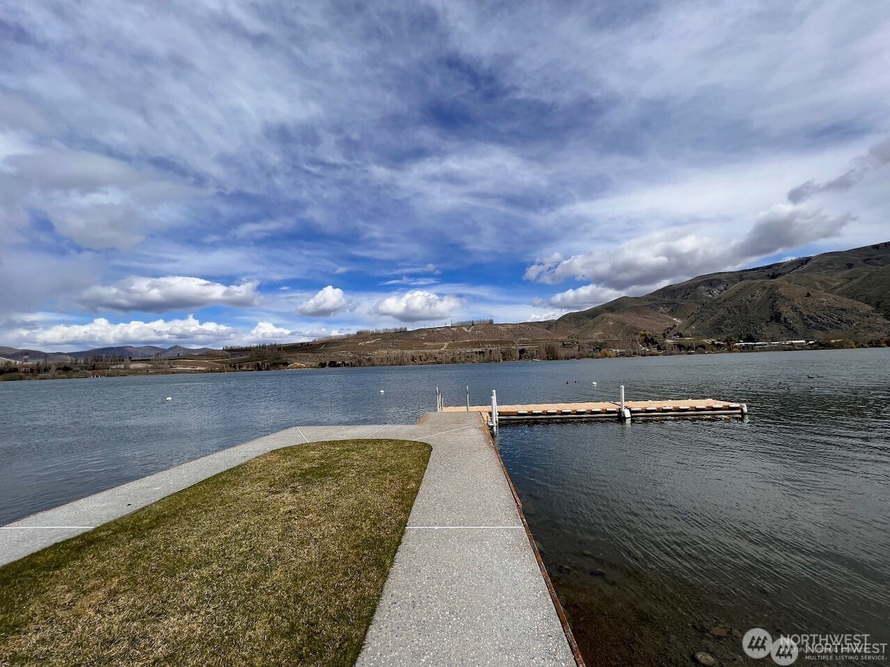 15330 Lakeview Street Entiat, WA 98822 - Photo 26 of 27 a view of a lake with a yard