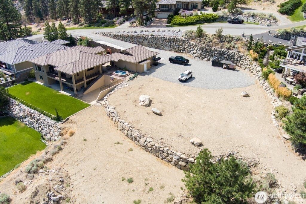 15330 Lakeview Street Entiat, WA 98822 - Photo 8 of 27 an aerial view of a house with a yard and lake view