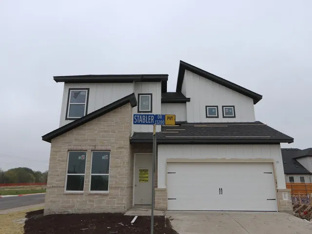 a house view with a outdoor space