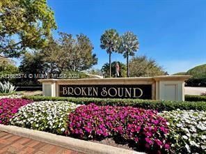 a view of a building with a backyard