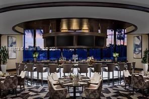 a view of outdoor space with patio and lake view