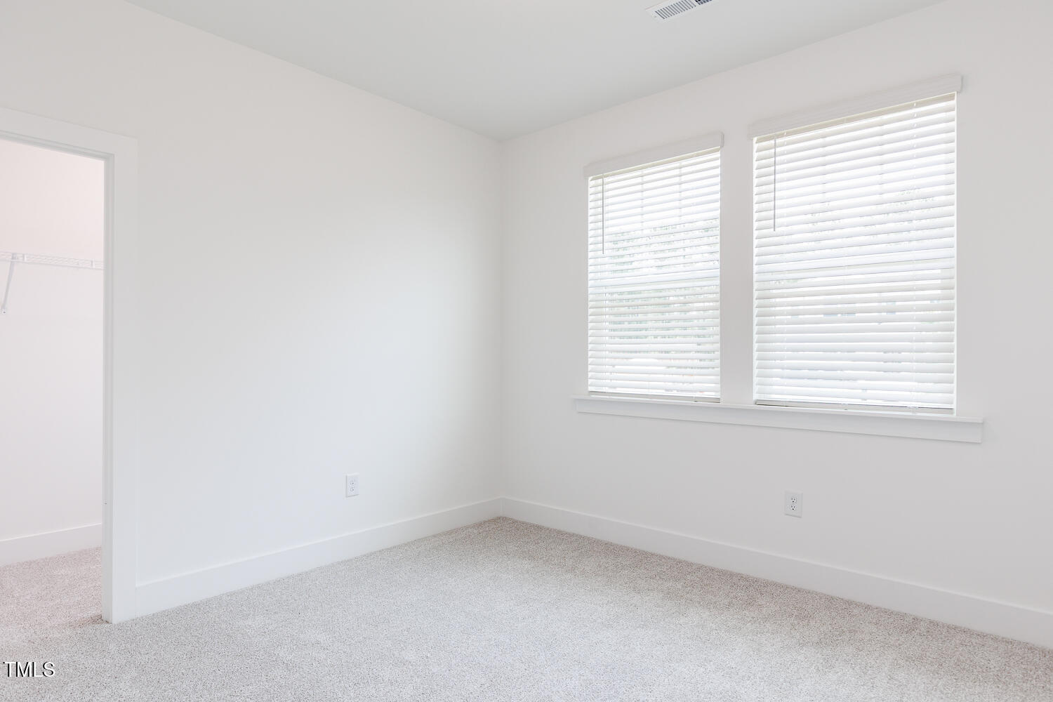 63 Tee Time Terrace Four Oaks, NC 27524 - Photo 13 of 36 an empty room with a window