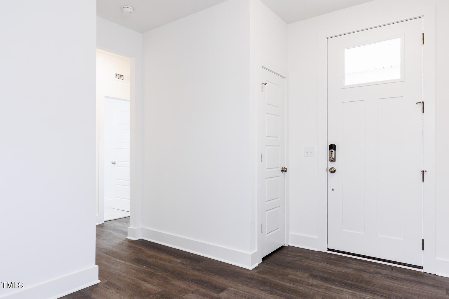 63 Tee Time Terrace Four Oaks, NC 27524 - Photo 17 of 36 a view of an empty room with wooden floor