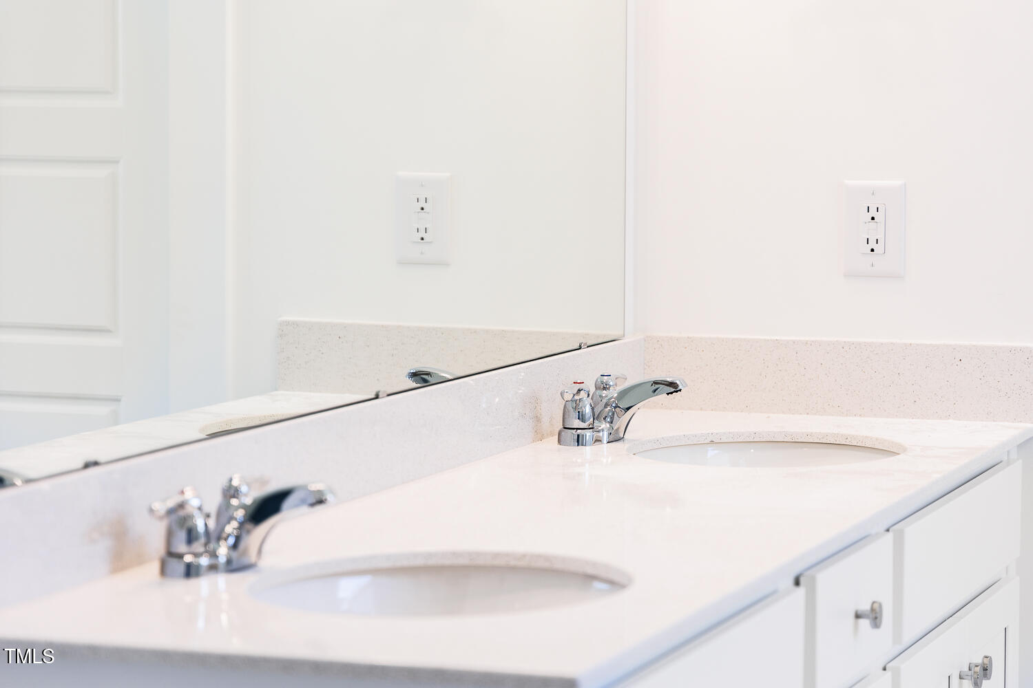 63 Tee Time Terrace Four Oaks, NC 27524 - Photo 23 of 36 a bathroom with a sink and a mirror
