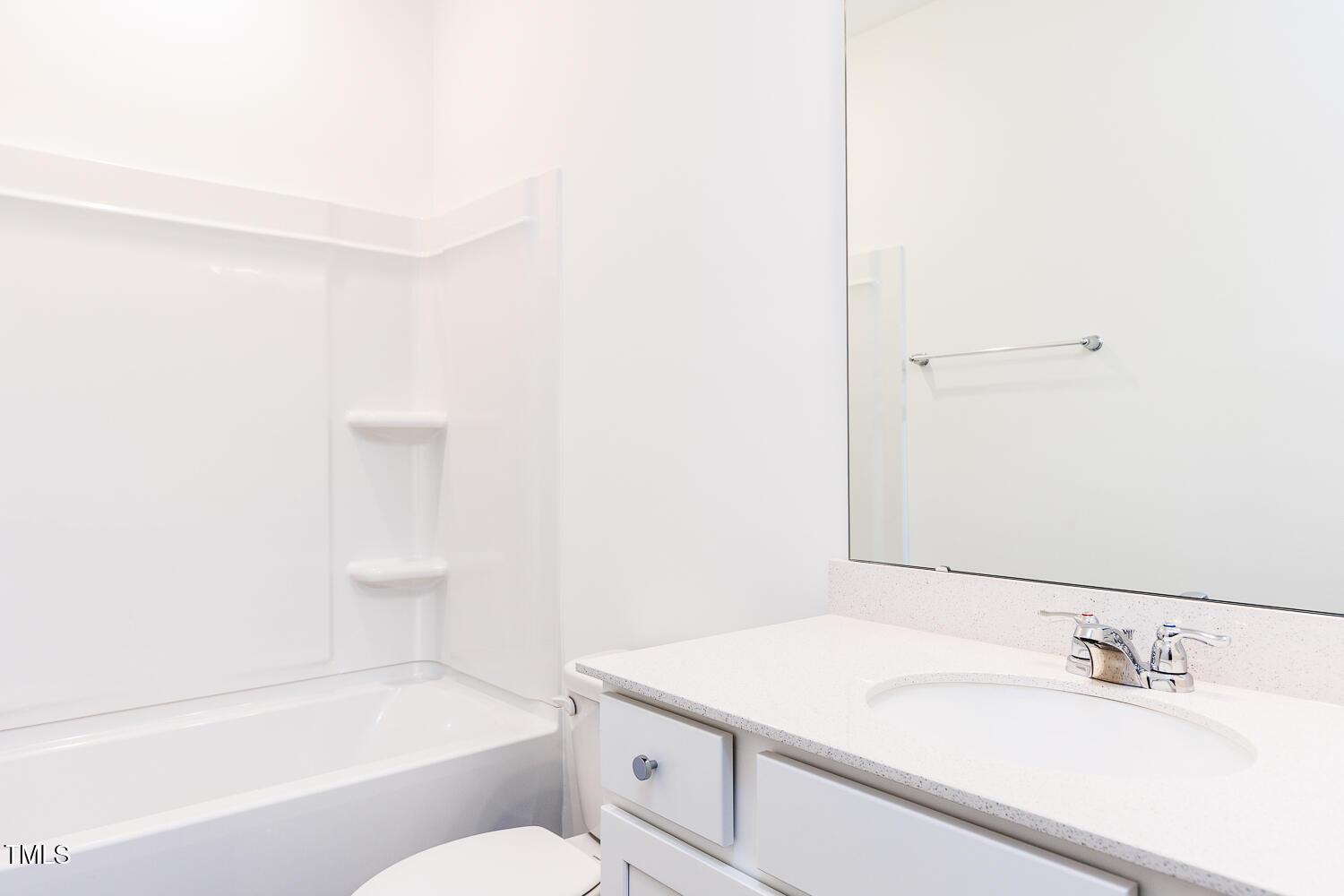 63 Tee Time Terrace Four Oaks, NC 27524 - Photo 24 of 36 a bathroom with a sink and a mirror