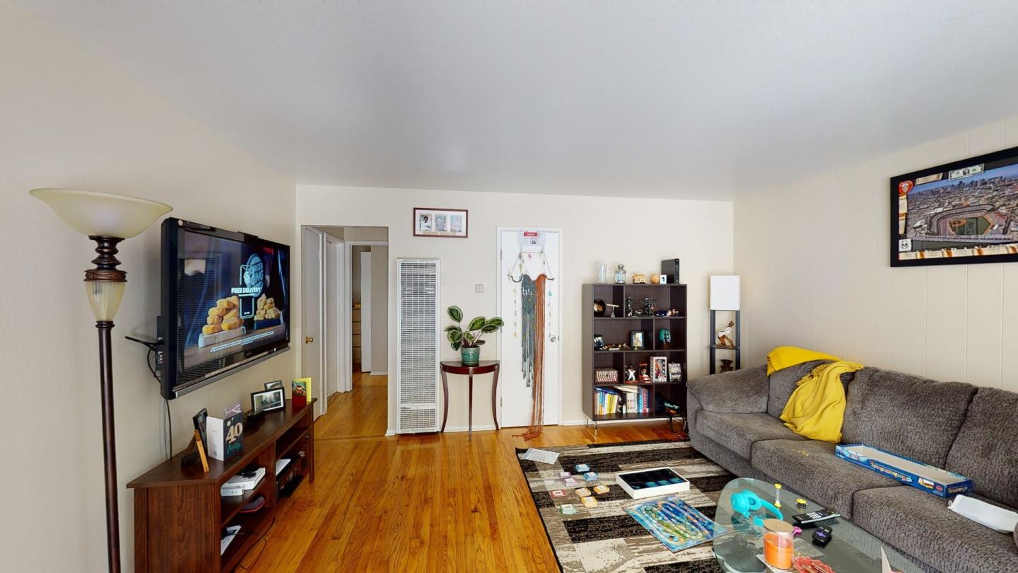 2408 Palmetto Avenue Pacifica, CA 94044 - Photo 3 of 51 a living room with furniture and bookshelf