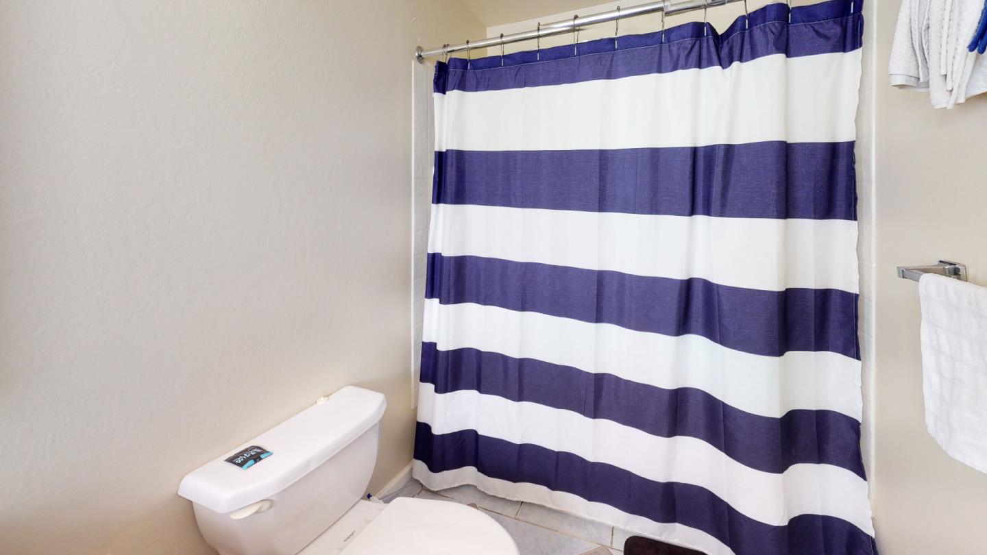 2408 Palmetto Avenue Pacifica, CA 94044 - Photo 43 of 51 a bathroom with a sink and mirror
