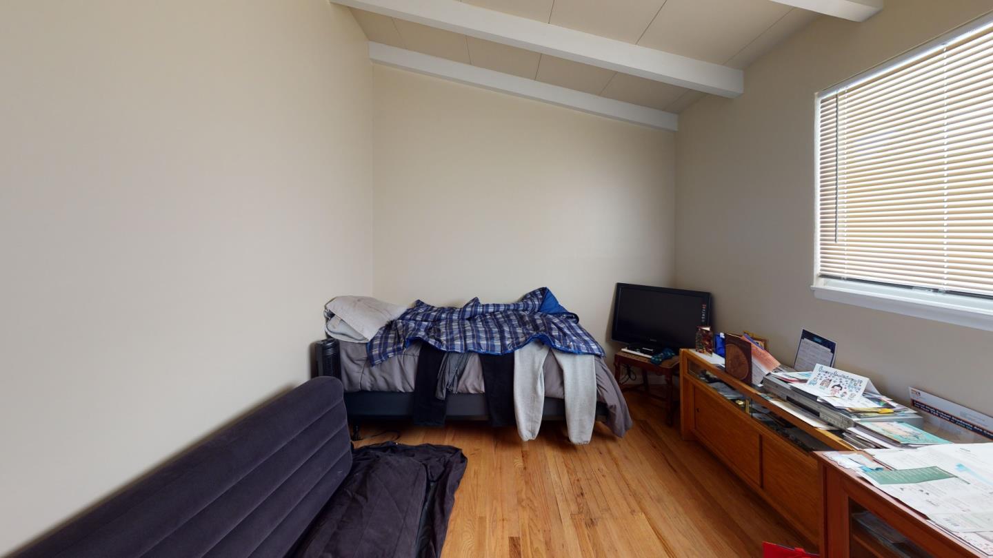 2408 Palmetto Avenue Pacifica, CA 94044 - Photo 45 of 51 a view of a workspace with furniture and a window