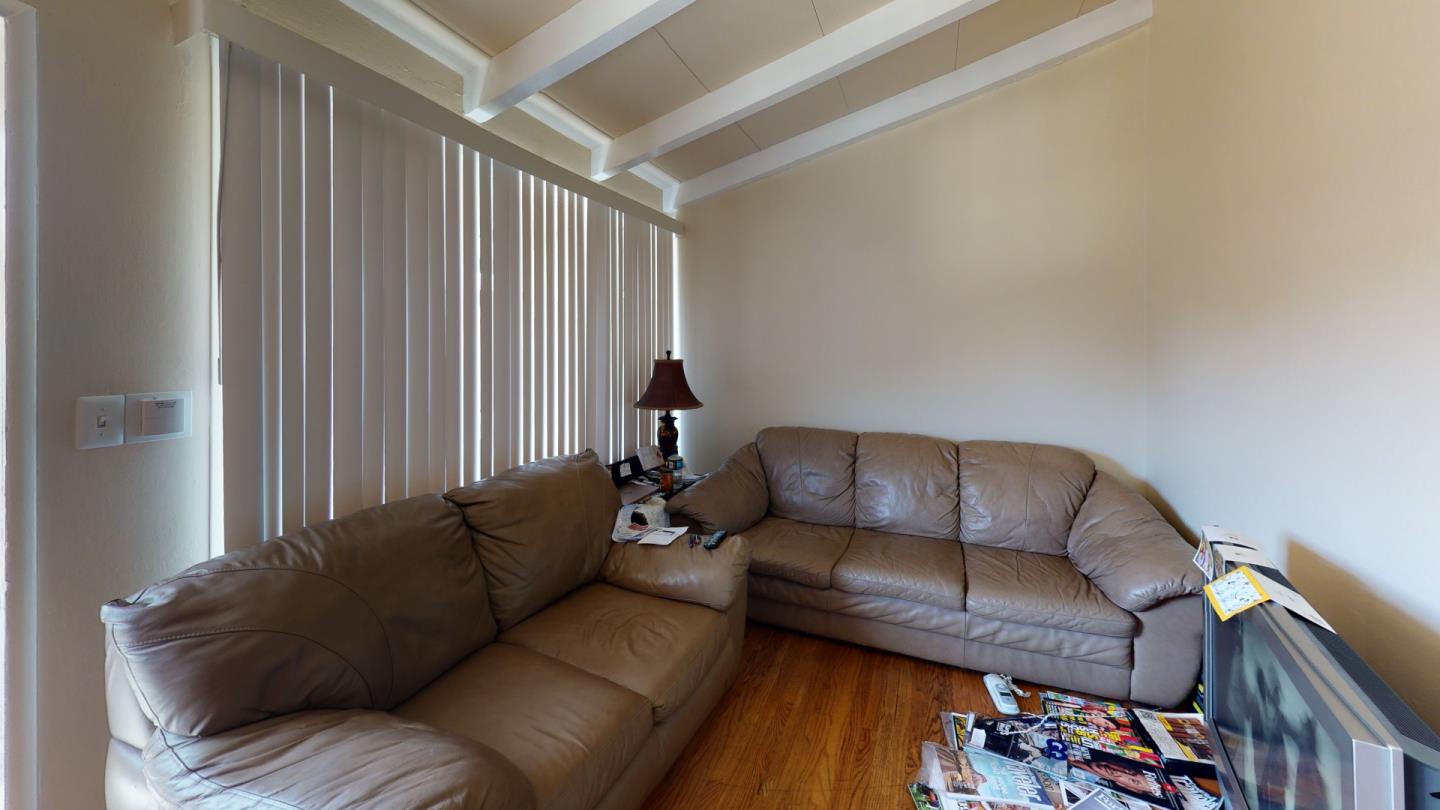 2408 Palmetto Avenue Pacifica, CA 94044 - Photo 48 of 51 a living room with furniture and a couch