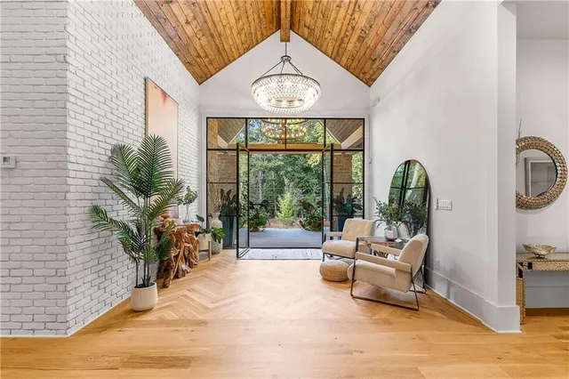a kitchen with granite countertop a sink and cabinets