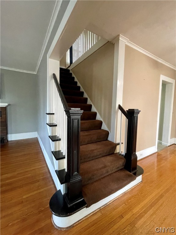6 Triangle Place Lysander, NY 13027 - Photo 12 of 47 Beautiful wooden staircase that leads to the secon
