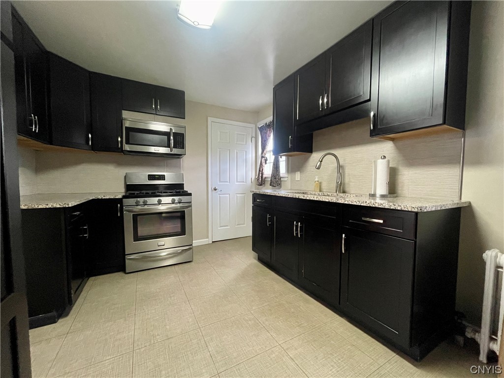 6 Triangle Place Lysander, NY 13027 - Photo 18 of 47 Nicely updated kitchen with stainless steel applia