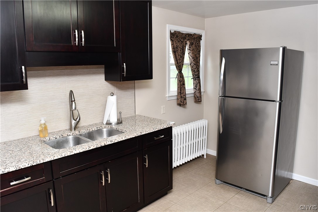 6 Triangle Place Lysander, NY 13027 - Photo 20 of 47 Refrigerator, gas stove and microwave are included