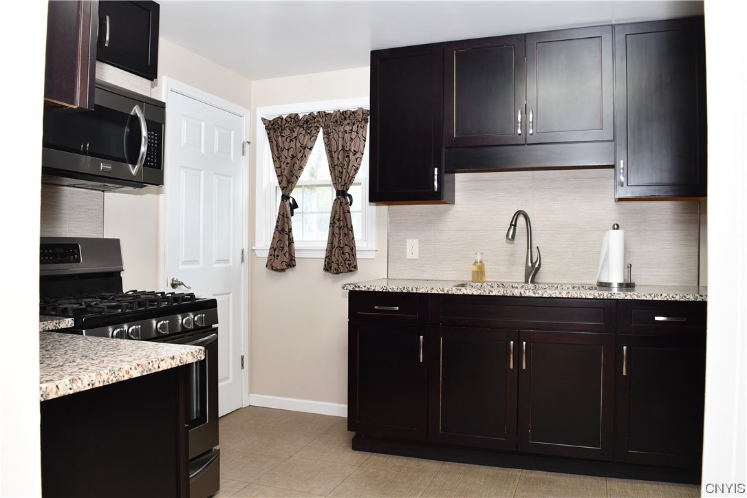 6 Triangle Place Lysander, NY 13027 - Photo 23 of 47 Lots of cupboard space to store all your kitchen s