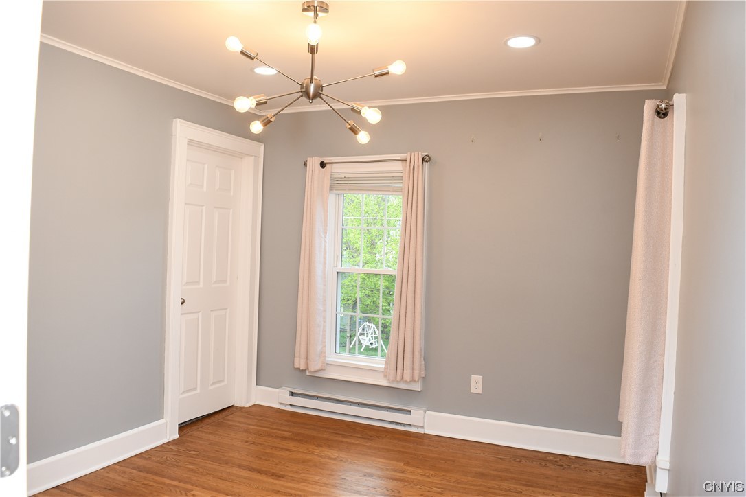 6 Triangle Place Lysander, NY 13027 - Photo 31 of 47 One of the 2 bedrooms with electric baseboard heat