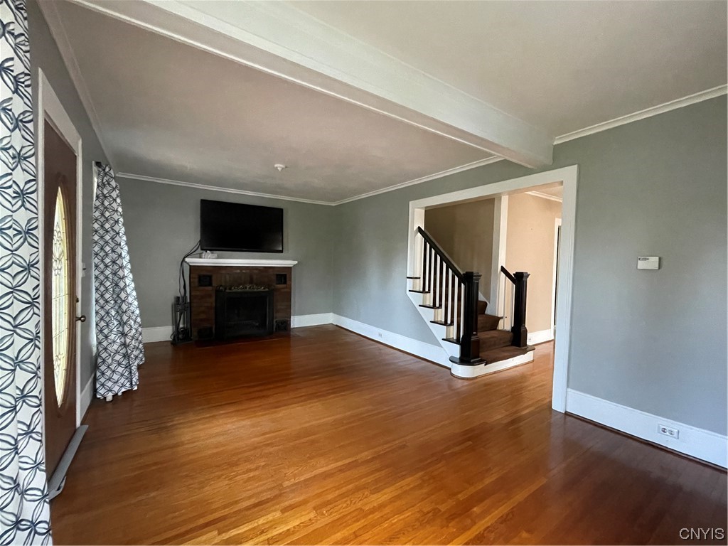 6 Triangle Place Lysander, NY 13027 - Photo 10 of 47 The wood stairs lead you to the second floor.