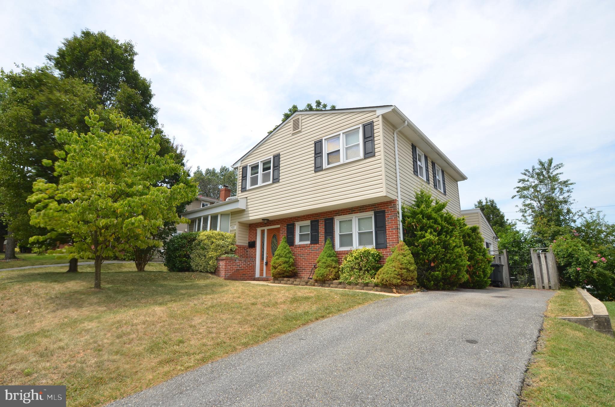 422 Madingley Road Linthicum Heights, MD 21090 - Photo 2 of 36 a front view of a house with a garden