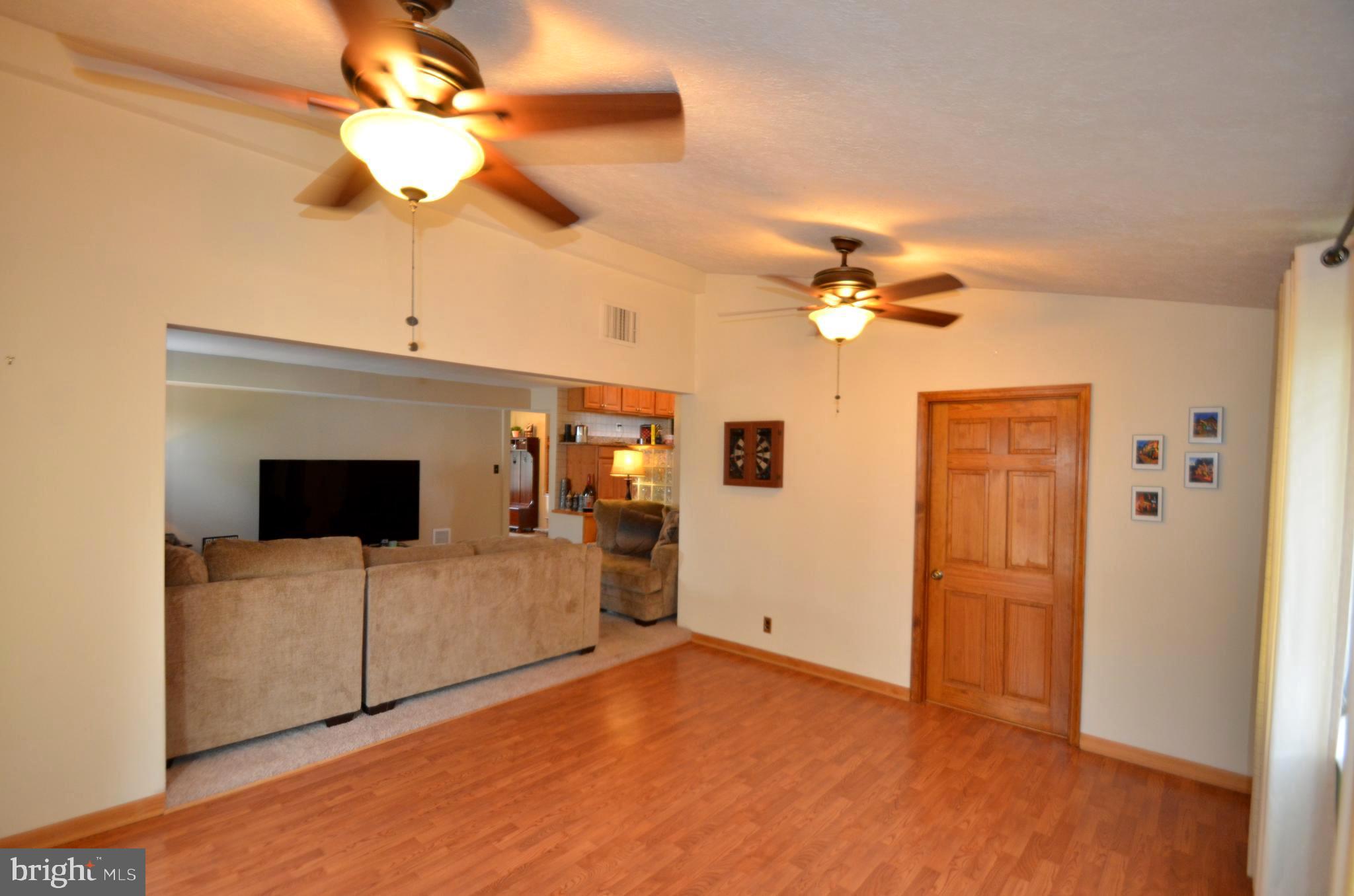 422 Madingley Road Linthicum Heights, MD 21090 - Photo 19 of 36 a view of livingroom with furniture and chandelier fan
