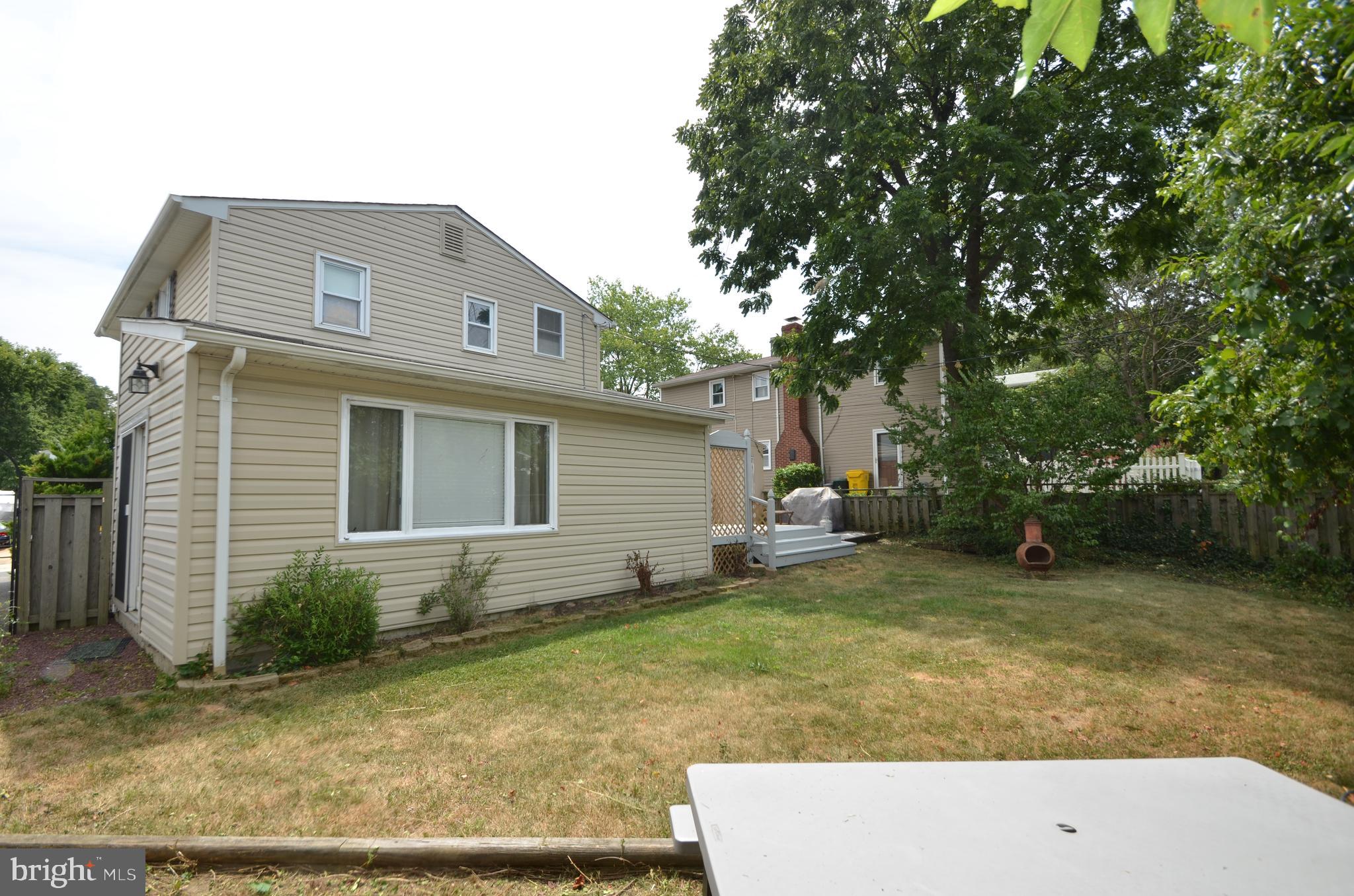 422 Madingley Road Linthicum Heights, MD 21090 - Photo 35 of 36 a view of a house with a yard and sitting area