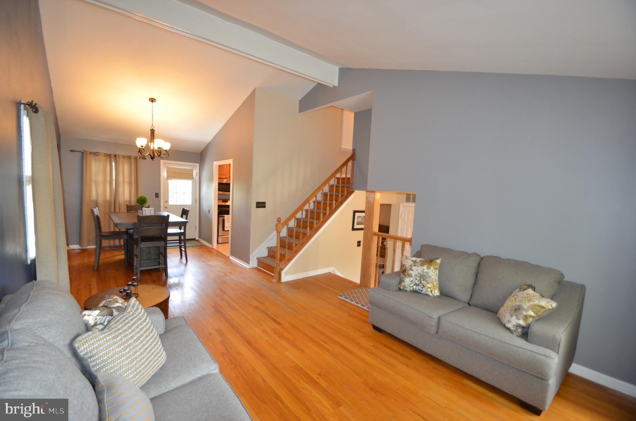 422 Madingley Road Linthicum Heights, MD 21090 - Photo 7 of 36 a living room with furniture and wooden floor