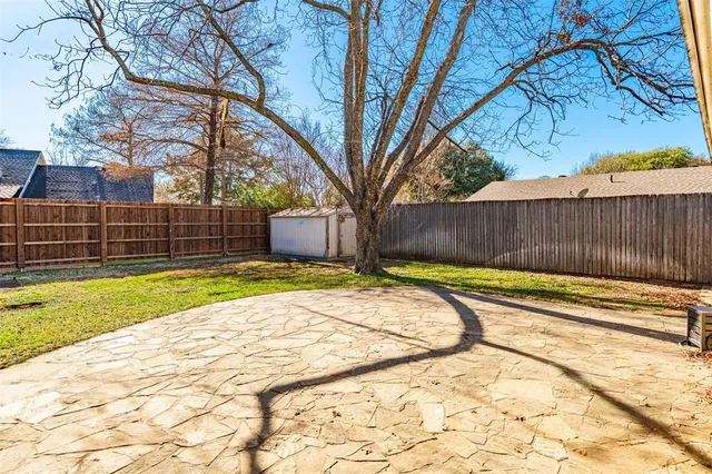 a view of a house with pool and chairs