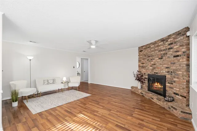 a bedroom with a bed and a fireplace