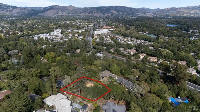 an aerial view of a city with lots of residential buildings