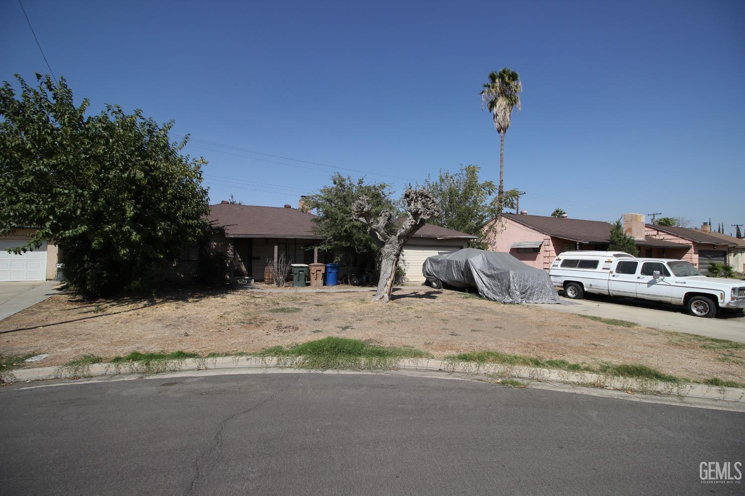 Undisclosed Address Bakersfield, CA 93309 - Photo 3 of 4 a car parked on the side of the road