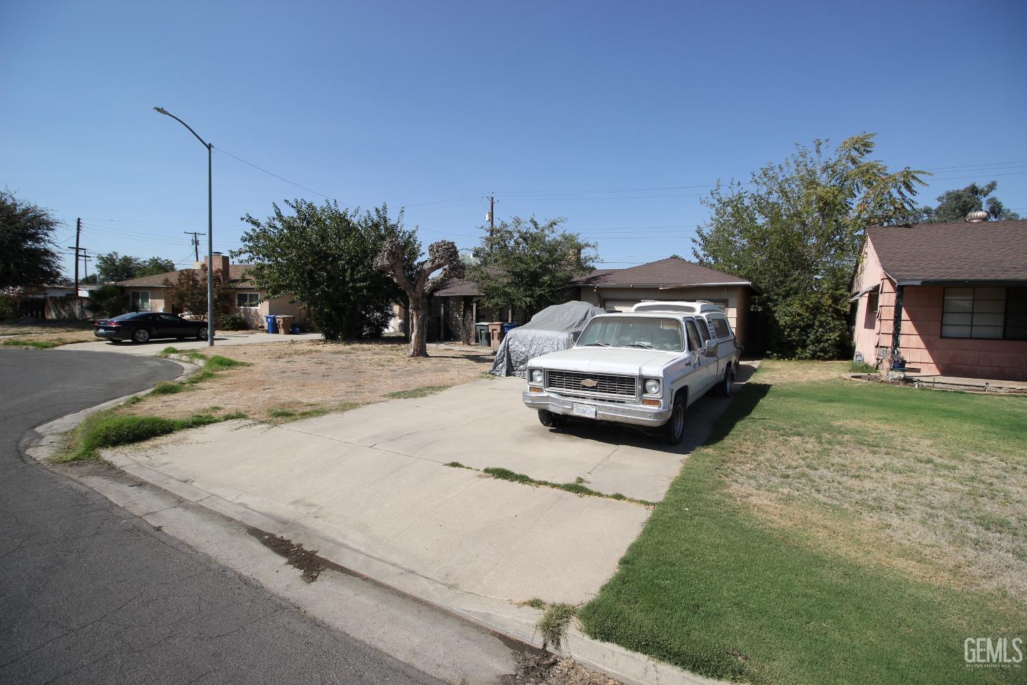 Undisclosed Address Bakersfield, CA 93309 - Photo 4 of 4 a car parked on the side of the road